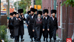 Gerer Chassidim Streaming Toward the Belzer Talmud Torah on 37th Street where they would spend Shabbos with the Rebbe